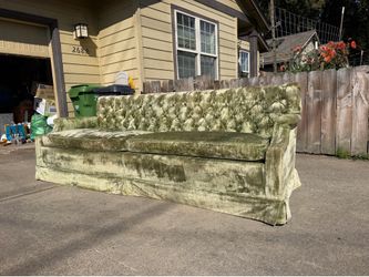 Vintage green velvet sofa