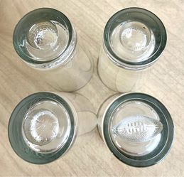 Vintage Barware Set of Glasses with molded Sports theme bottoms….Football, Golf, Baseball, Basketball