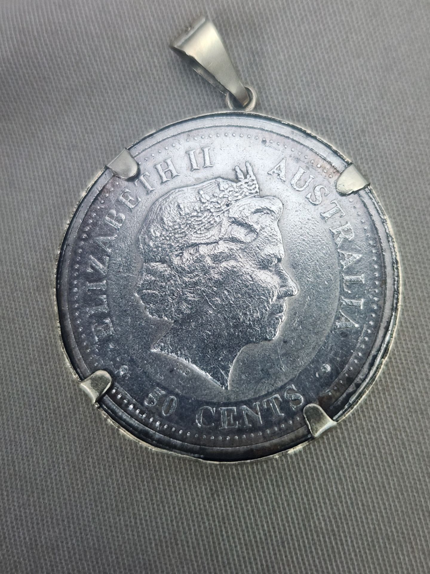 1/2 oz 999 silver coin with 14k frame
