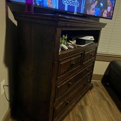 wooden chest of drawers with integrated power outlet