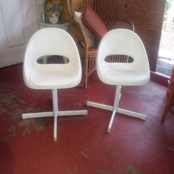 2 Swivel Chairs. 