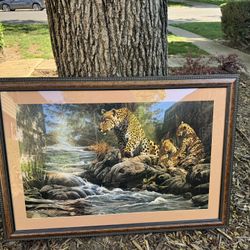 very nice big pix of Family cheeta  on nice glass wooden frame 