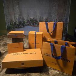 Empty Louis Vuiton gift bags and boxes