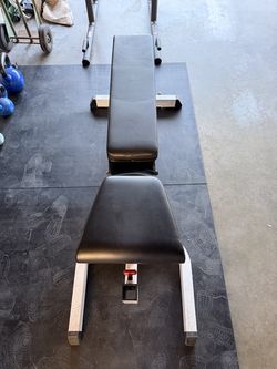 Body solid bench and bicep attachment