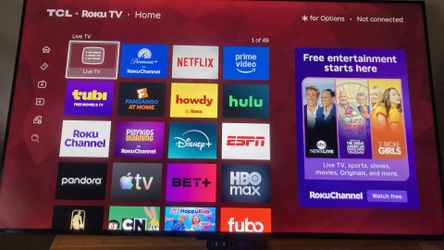 55 Inch TCL Smart TV w/ rotating wall mount, and remote control