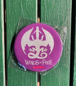 Brand new Scholastic Wings of Fire button, silver glitter dragon