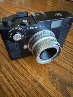 Leica CL 35mm film rangefinder camera paired with the Leica 35mm f3.5 classic lens.