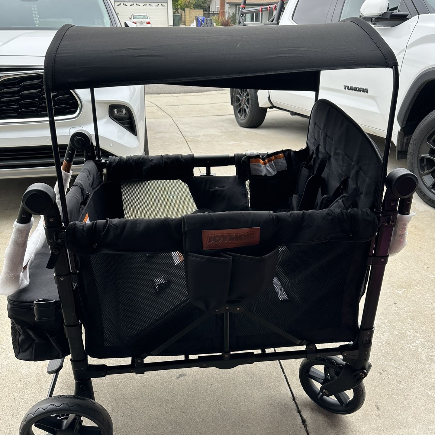  Double Stroller Wagon Featuring 2 High Face-to-Face Seats with 5-Point Harnesses, Adjustable Push Handle, and Height Adjustable UV