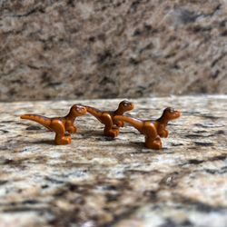 In very good condition Lego baby raptor lot of 3