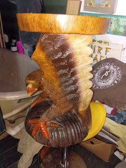 Carved wood eagle table