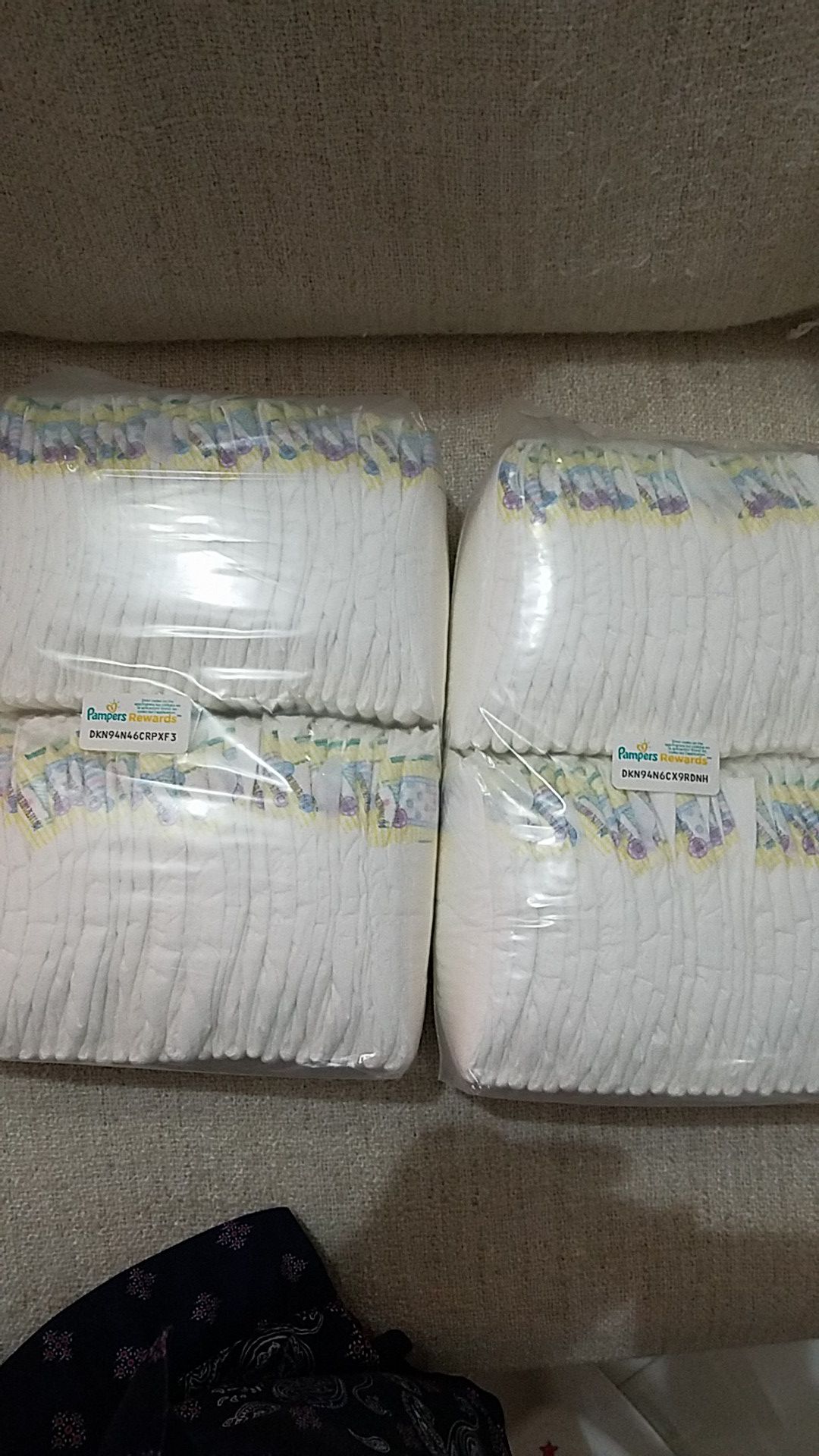 2 paquetes diapers new 108 en total size newborn