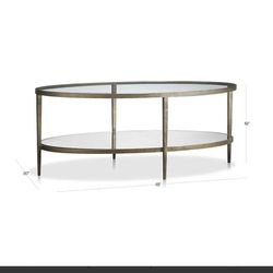 Crate & Barrel Clairemont Oval Coffee Table – Glass & Hammered Iron