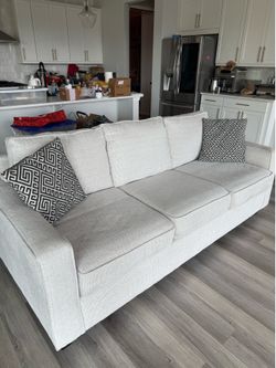 Like new/ mint condition sofa with warranty