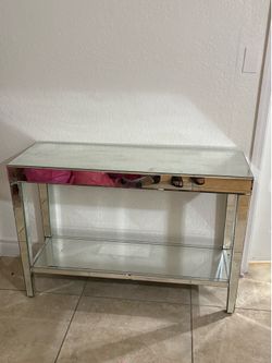 Mirrored console table with imperfections
