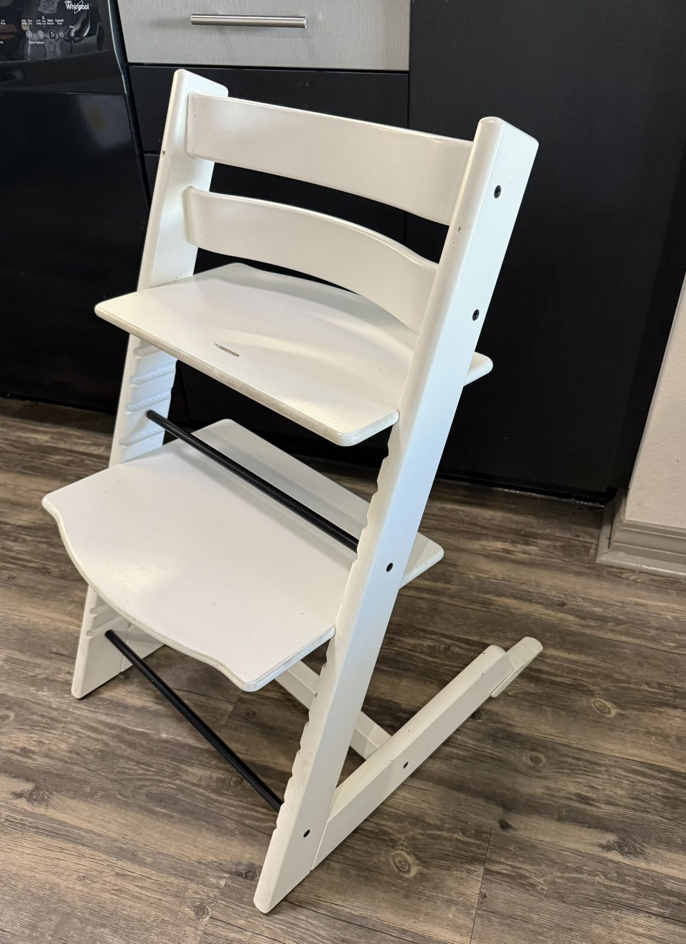 Stokke Tripp Trapp White Wood High Chair with baby setup and tray