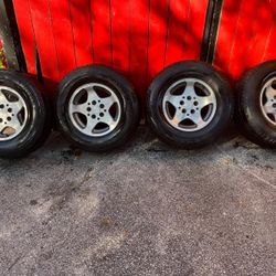 4 used rims size 15" 5x115 with tires 235/75/15 $750