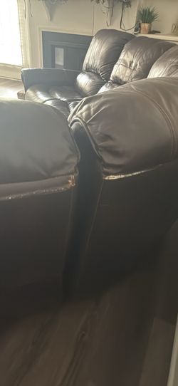 Brown leather sectional with electric recliners both ends
