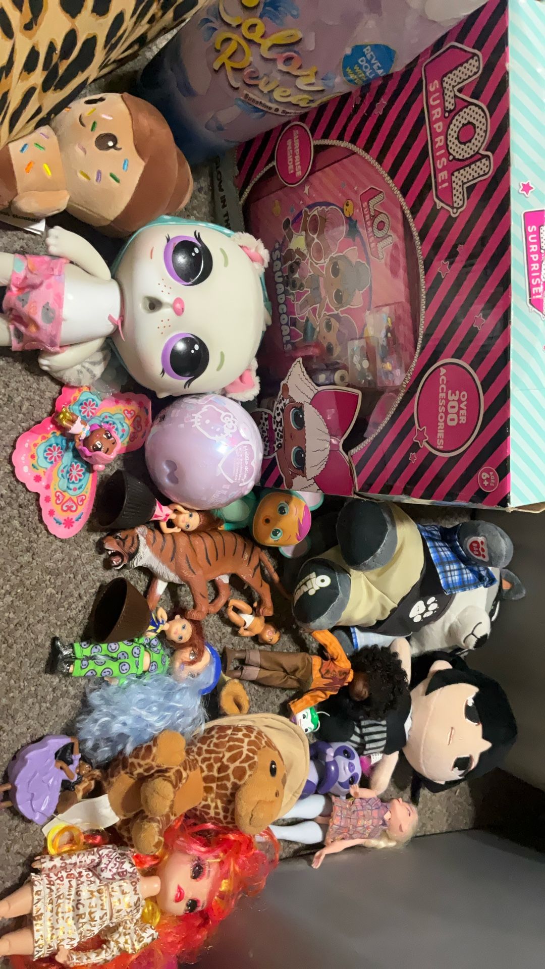 Large lot of toys includes brand new hello Kitty 50th anniversary surprise bowl includes unopened brand new Barbie color reveal includes lol suurprise
