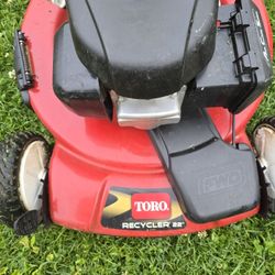 Lawn mower for sale. It works very well, it has been used very little, and it has the Hyundai badge on it.