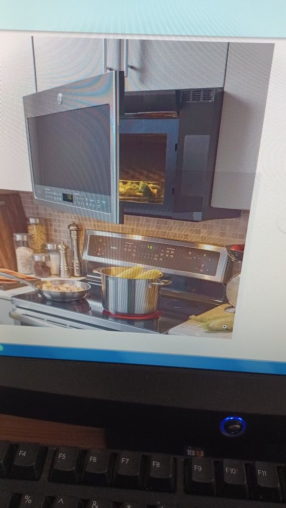 New Inbox GE Profile 2.1 Cubic Foot Over The Range Microwave Oven With Sensor Cooking Stainless Steel