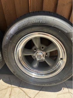 New five lug rims and tires