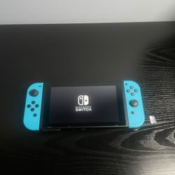 Nintendo Switch 32GB Console Black with Neon Blue Joy Cons & 128GB SanDisc MicroSD