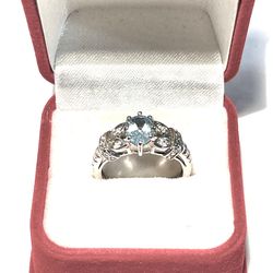 Brand new .925 silver ring with aquamarine and cubic zirconia CZ diamonds. Size 9.