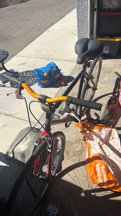 Used Bicycle with Yellow Handlebars