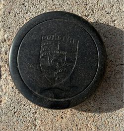 70mm Porsche center cap, original equipment manufacturer.