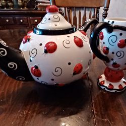 Ladybugs Teapot & Glass to match.