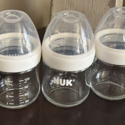 Set Of 4 Glass Nuk Bottles 4 Ounces 