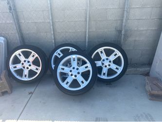 22” Chevy/GMC rims & tires