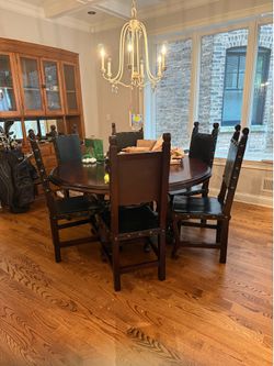 Habersham round 60” table with 6 leather chairs