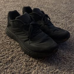 Adidas black running shoes