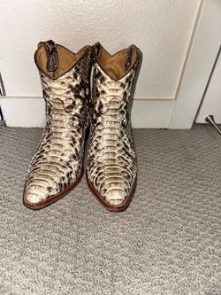 Woman’s exotic booties size 9
