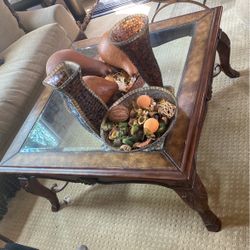 wood frame table with glass and wrought iron