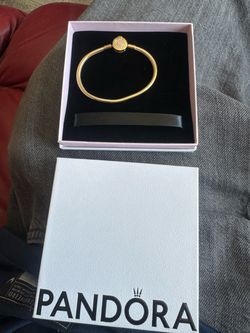 Brand new untouched Gold Tone Pandora Snake- Chain Bracelet with a round Pave-style clasp