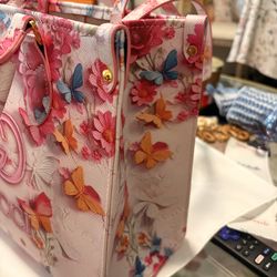 Spring hand bag with attached straps  if you want a shoulder bag too.