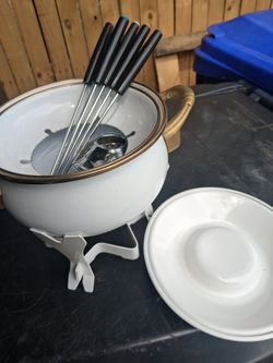 Fondue warmer.  Set. New.   Free