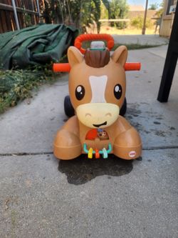 Fisher-Price Walk, Bounce & Ride Pony, designed for children aged 9 to 36 months.