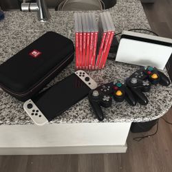 OLED white Nintendo switch With 9 Premium Games