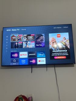 70 inch tv Roku like new