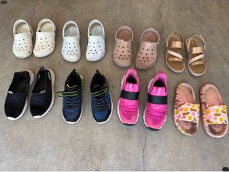 Youth kids shoe lot, includes: crocs, running shoes, summer sandals all in good condition sizes vary.  White crocs size: 4/6 Tie-dye crocs size 4/6 Pi
