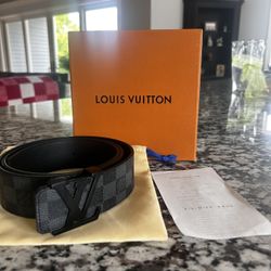 Lois Vuitton Belt (caption)