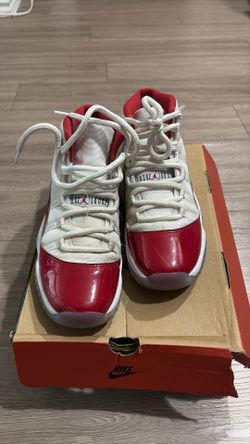 Red and white Jordan 11s