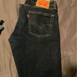  2 Levis 513 Jeans 