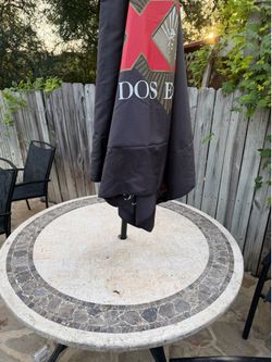 Patio table w 4 chairs and umbrella