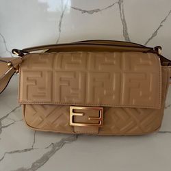  Baguette bag in like new condition. Comes with box and dust bag