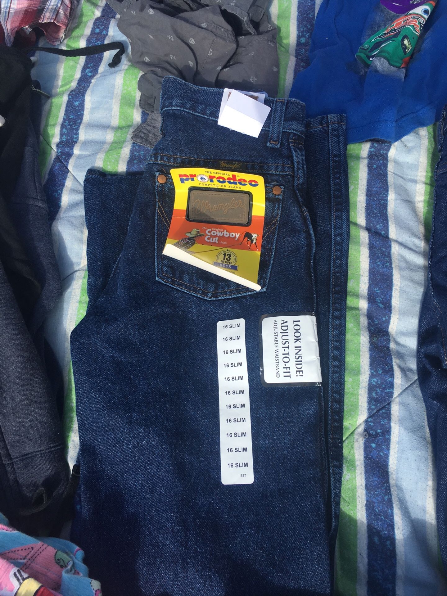 Wrangler pants size 16 slim and 14 regular 2 for $40