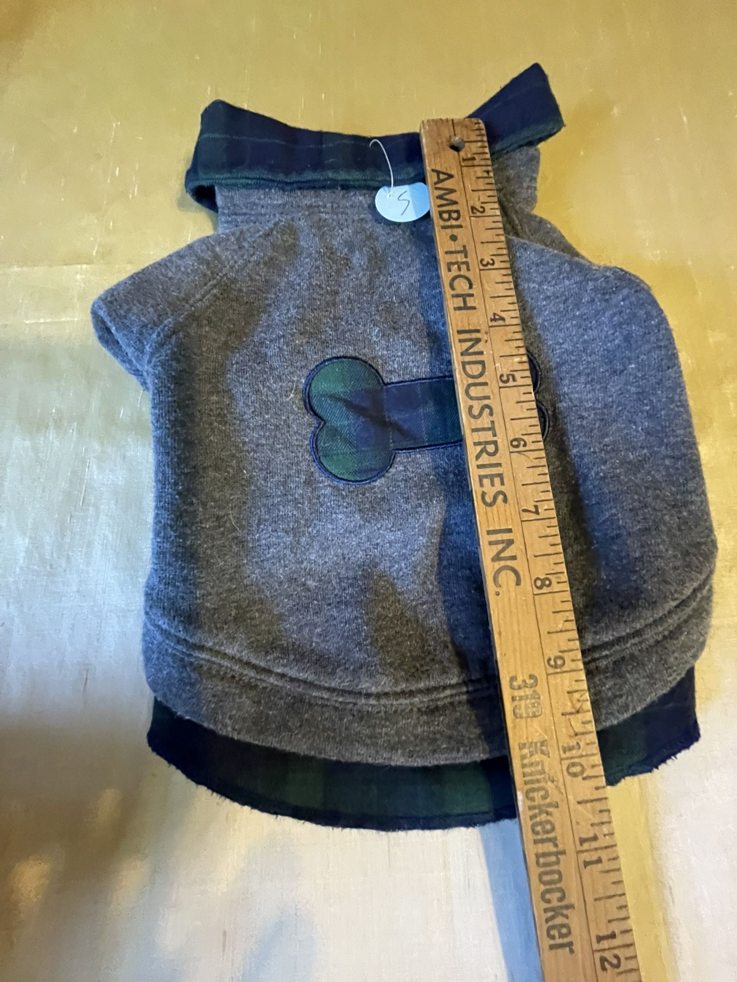 Cozy gray dog sweater with Gray accents. Perfect for keeping your pet warm.